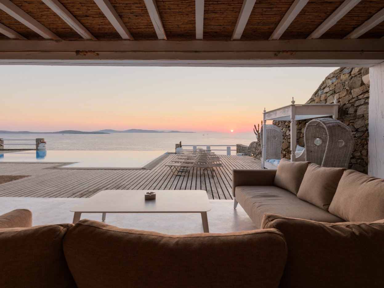 Interior living room to pool at dawn