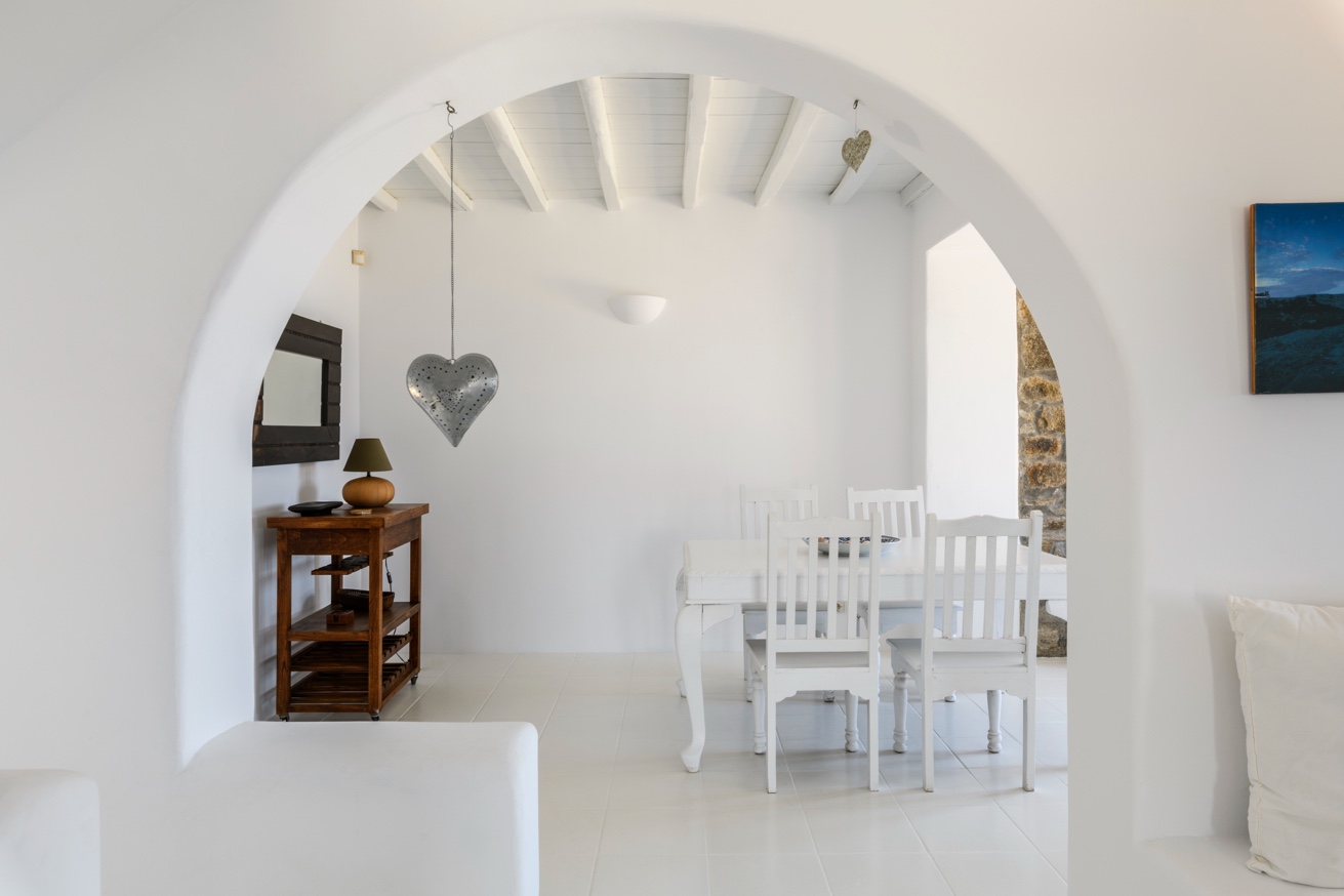 Contemporary bedroom with decorative stone wall